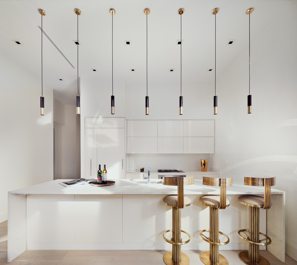 Simple kitchen design in all white, with golden fittings and knobs for Kitchen Decor - Beautiful Homes